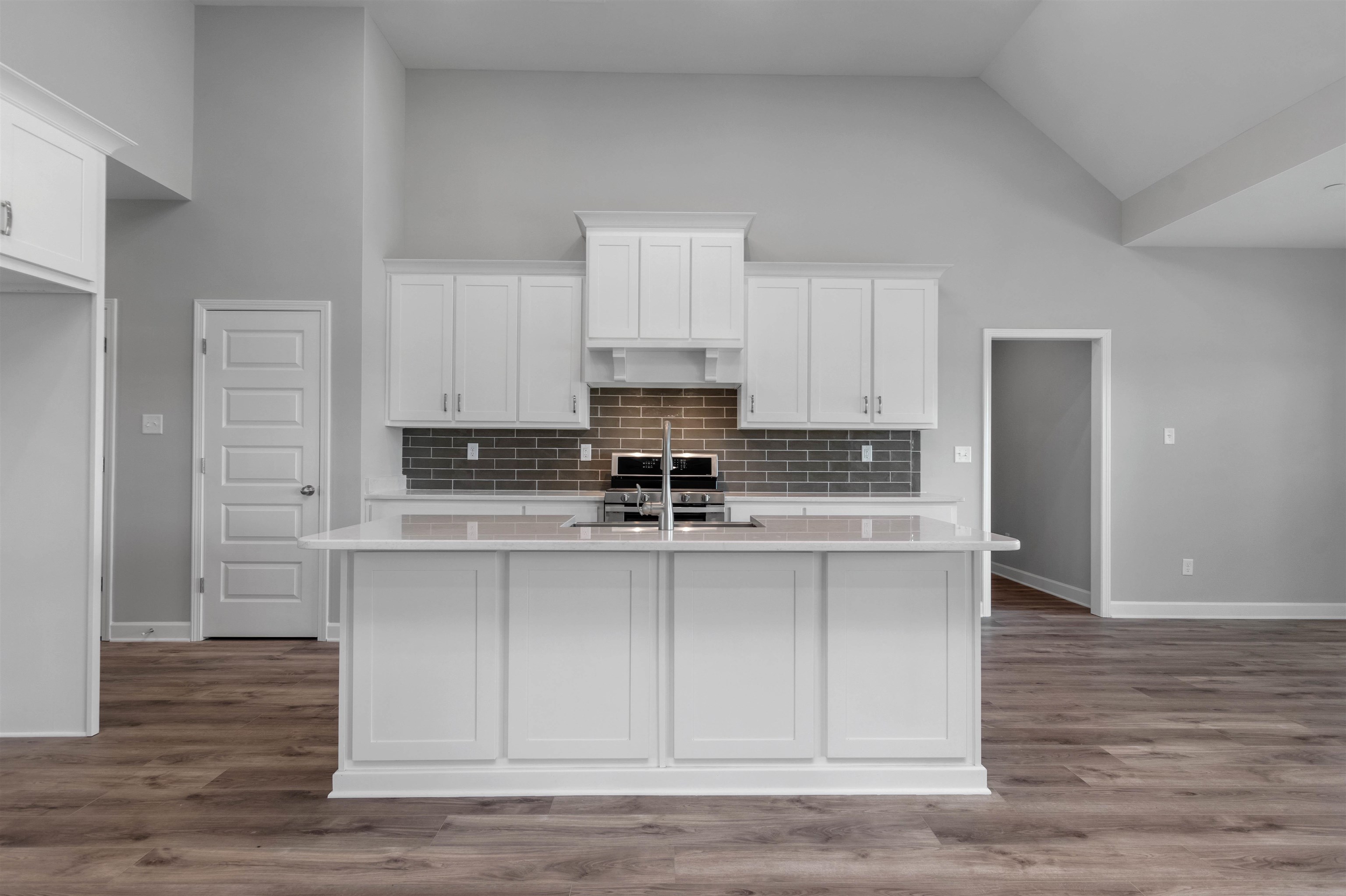 20 Grassy Hill Road Collierville, TN 38017 - Photo 8 of 27 a view of kitchen with stainless steel appliances granite countertop cabinets and wooden floor