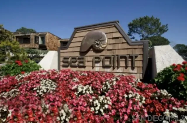 a view of a swimming pool with a balcony