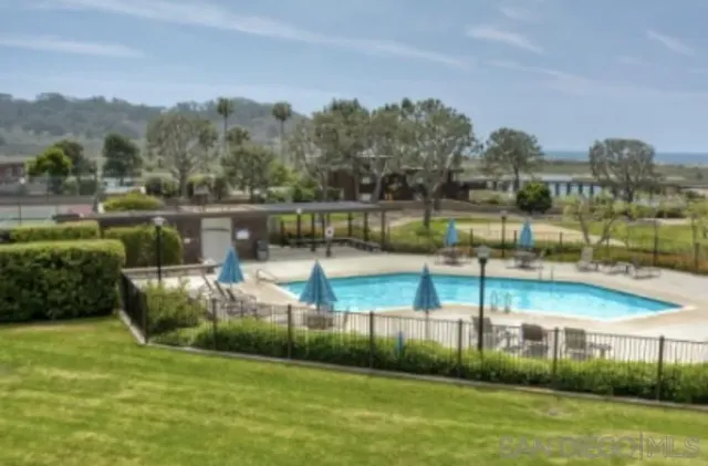 a view of a backyard with a garden