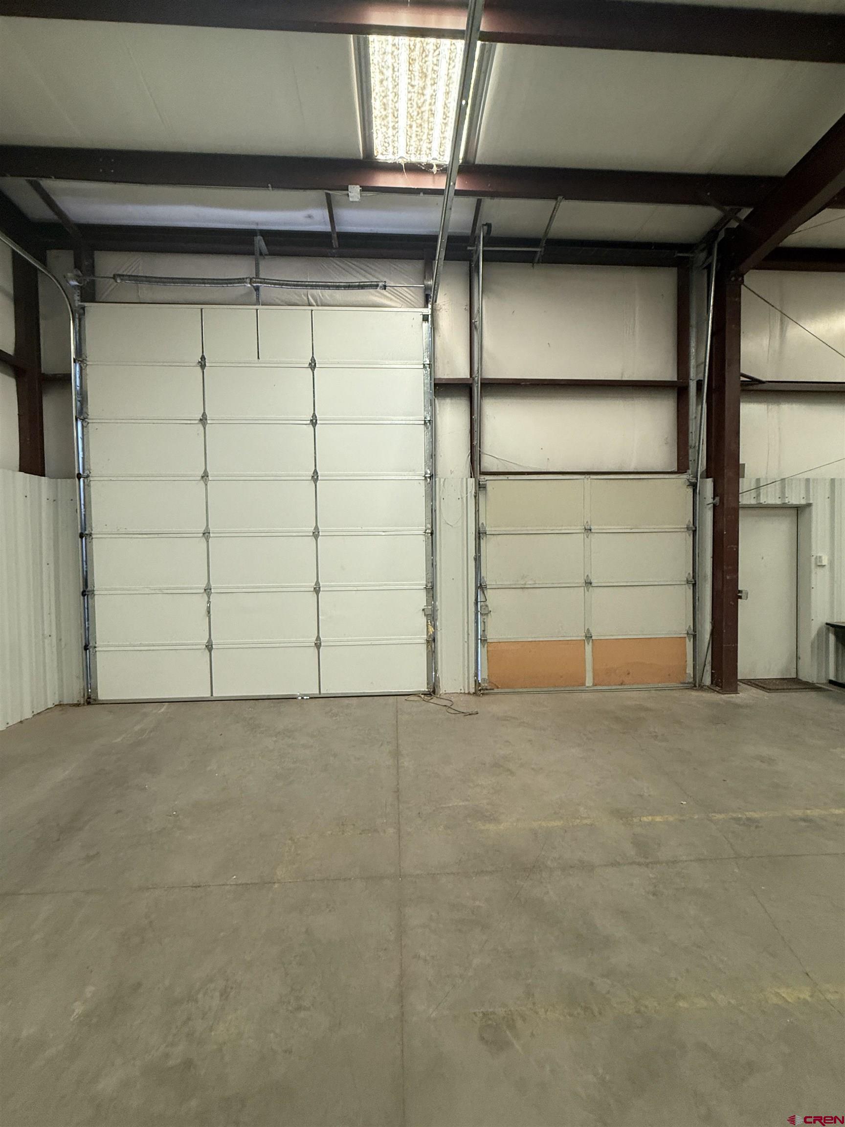 675 Industrial Boulevard, Unit 102 AND WAREHOUSE Delta, CO 81416 - Photo 16 of 24 a view of a garage