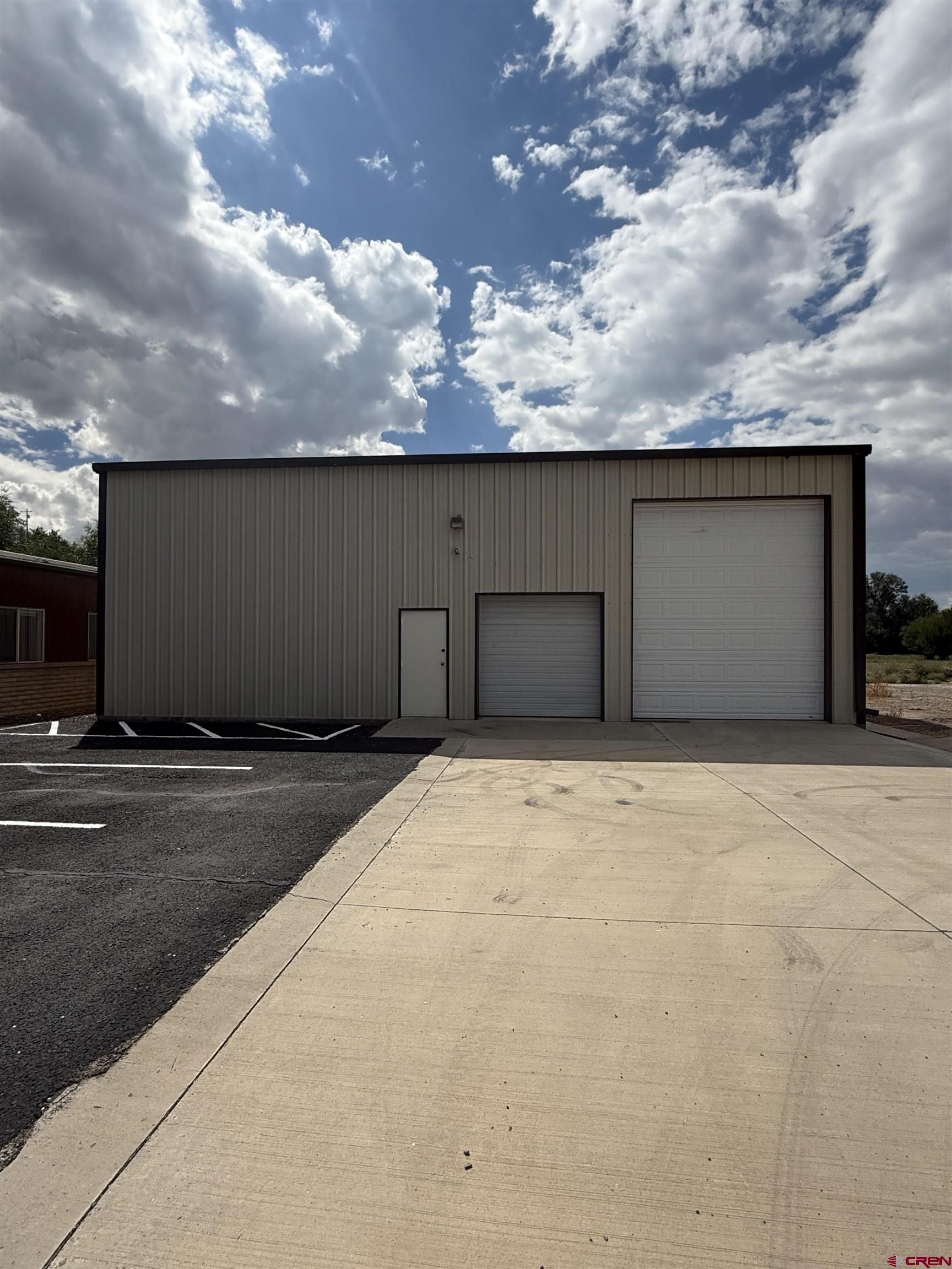 675 Industrial Boulevard, Unit 102 AND WAREHOUSE Delta, CO 81416 - Photo 19 of 24 a backyard of a house