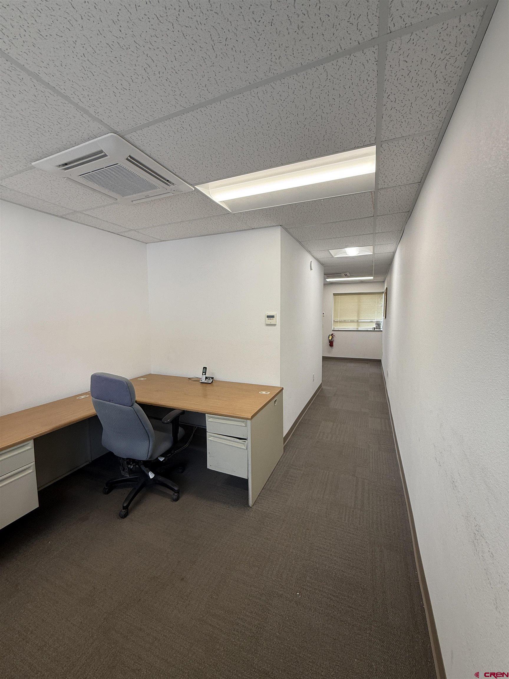 675 Industrial Boulevard, Unit 102 AND WAREHOUSE Delta, CO 81416 - Photo 7 of 24 a room with furniture