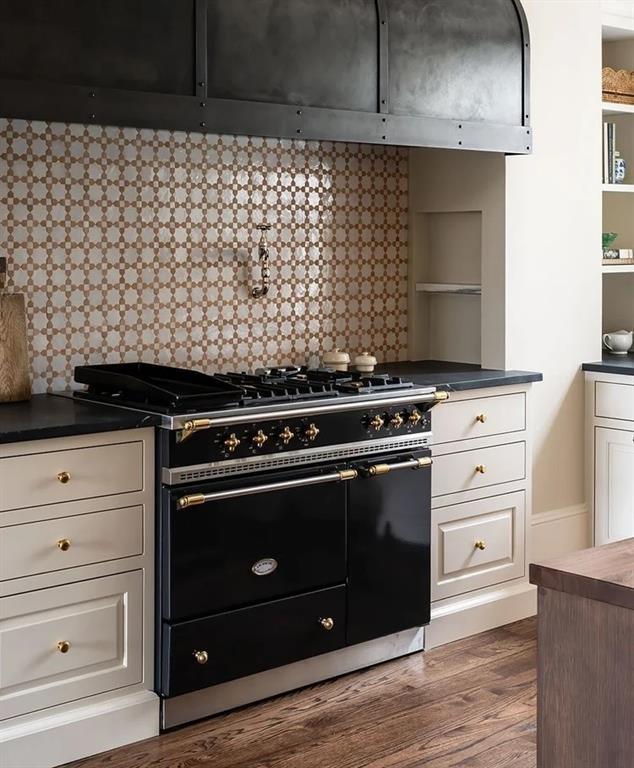 2681 Conns Creek Road Ball Ground, GA 30107 - Photo 11 of 26 a stove top oven sitting inside of a kitchen