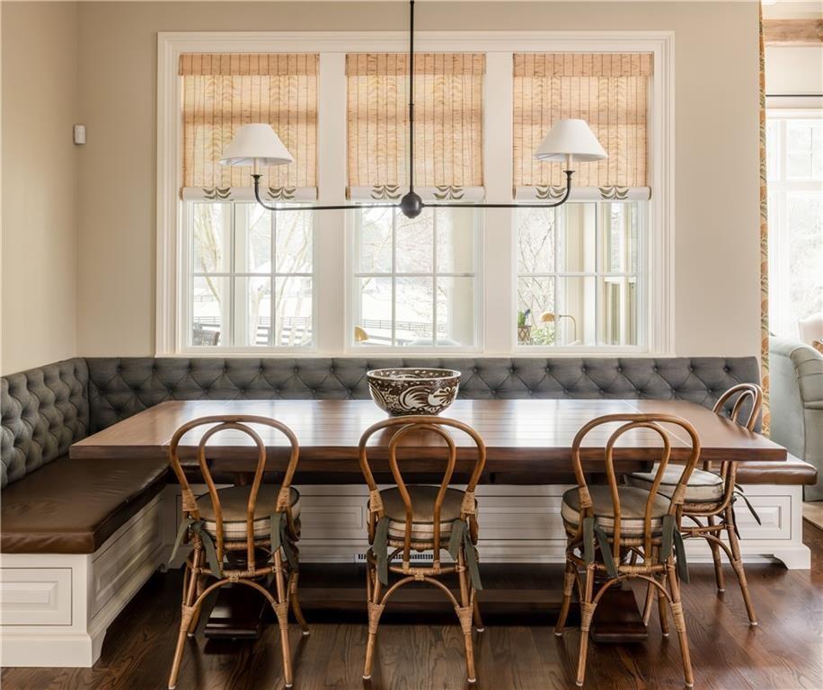 2681 Conns Creek Road Ball Ground, GA 30107 - Photo 12 of 26 a view of a dining room with furniture and windows