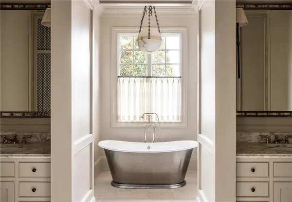 front view of a house with a yard balcony