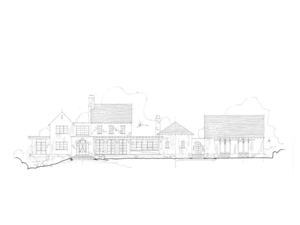 a view of a large white building and a city view