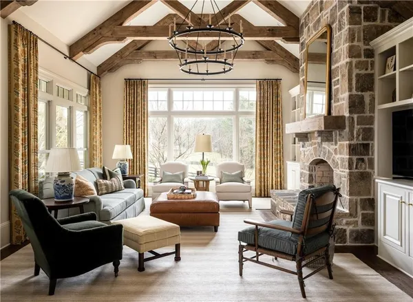 a living room with furniture and a fireplace