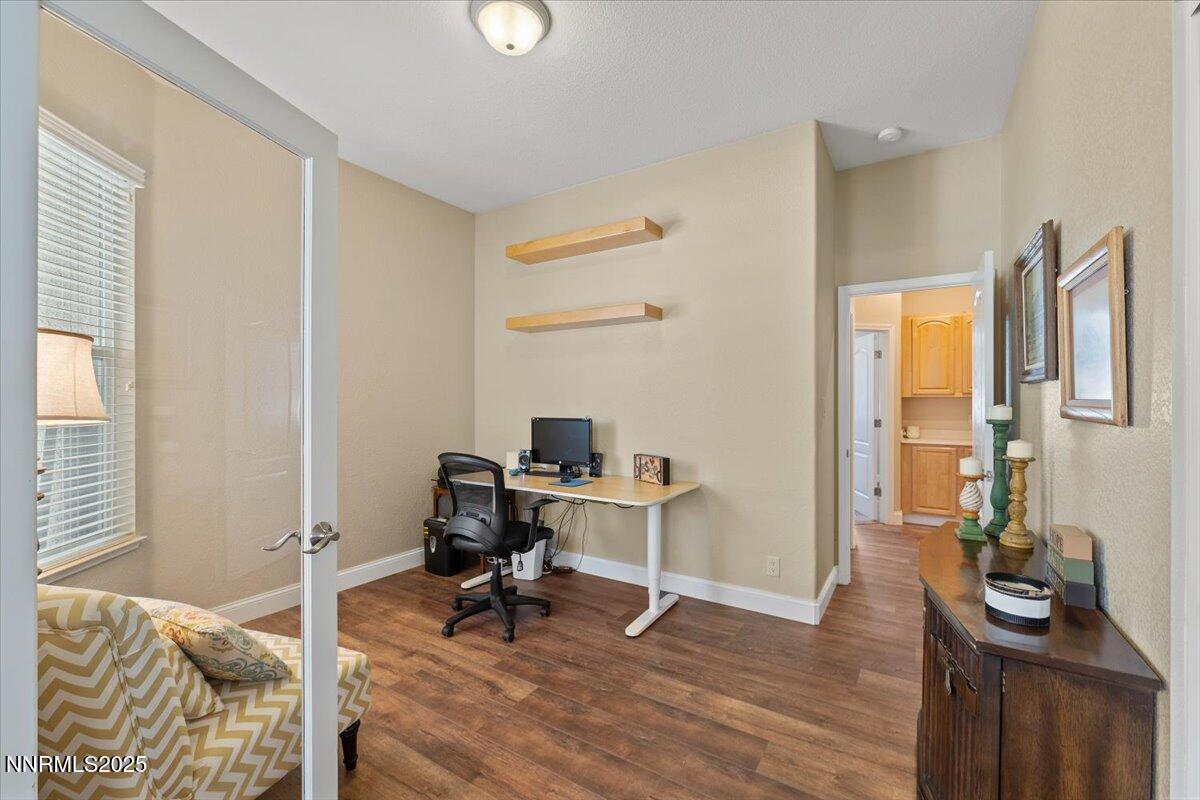 2415 Lincoln Meadows Drive Reno, NV 89521 - Photo 24 of 38 a view of a workspace with furniture and a window