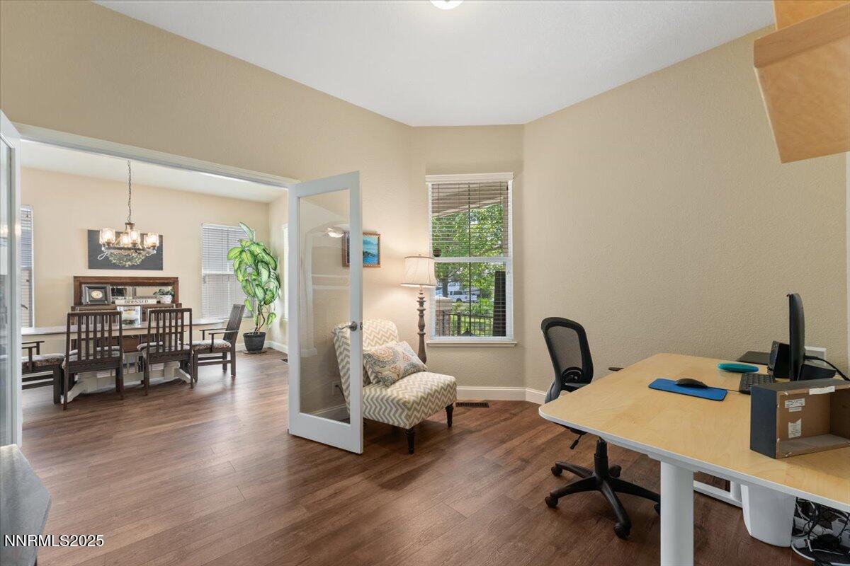 2415 Lincoln Meadows Drive Reno, NV 89521 - Photo 25 of 38 a living room with furniture and a table