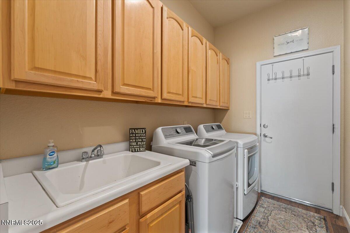 2415 Lincoln Meadows Drive Reno, NV 89521 - Photo 26 of 38 a utility room with dryer and washer