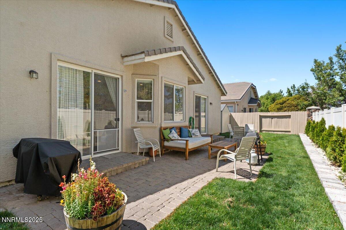 2415 Lincoln Meadows Drive Reno, NV 89521 - Photo 28 of 38 a view of a house with backyard and sitting area
