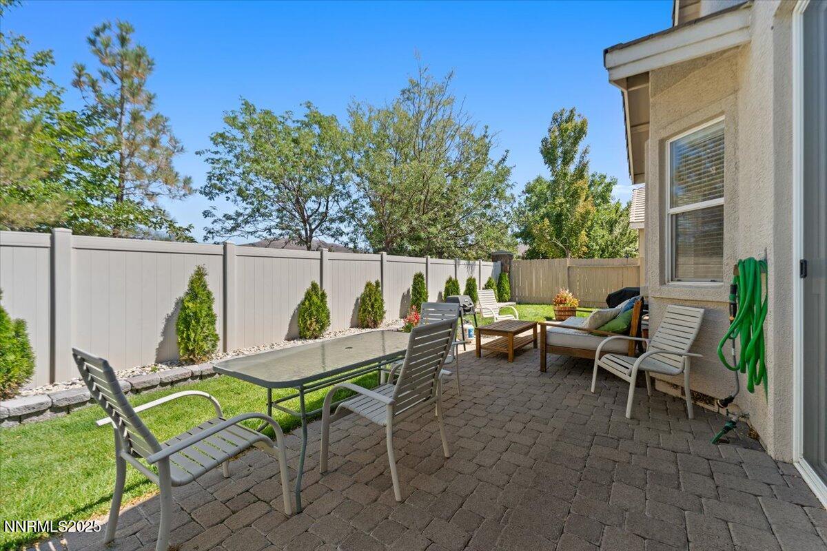 2415 Lincoln Meadows Drive Reno, NV 89521 - Photo 31 of 38 a view of chair and tables