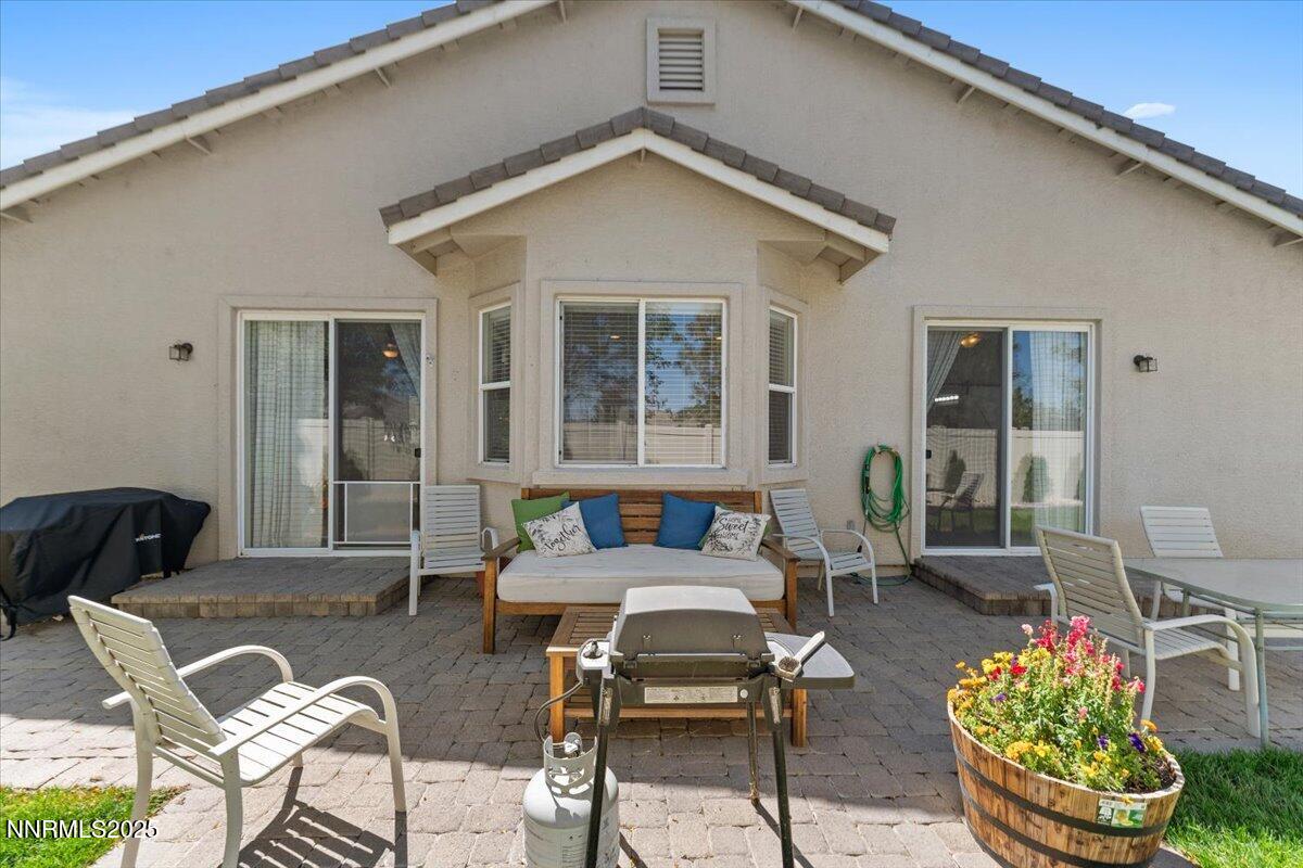 2415 Lincoln Meadows Drive Reno, NV 89521 - Photo 36 of 38 a outdoor space with a couch and chairs