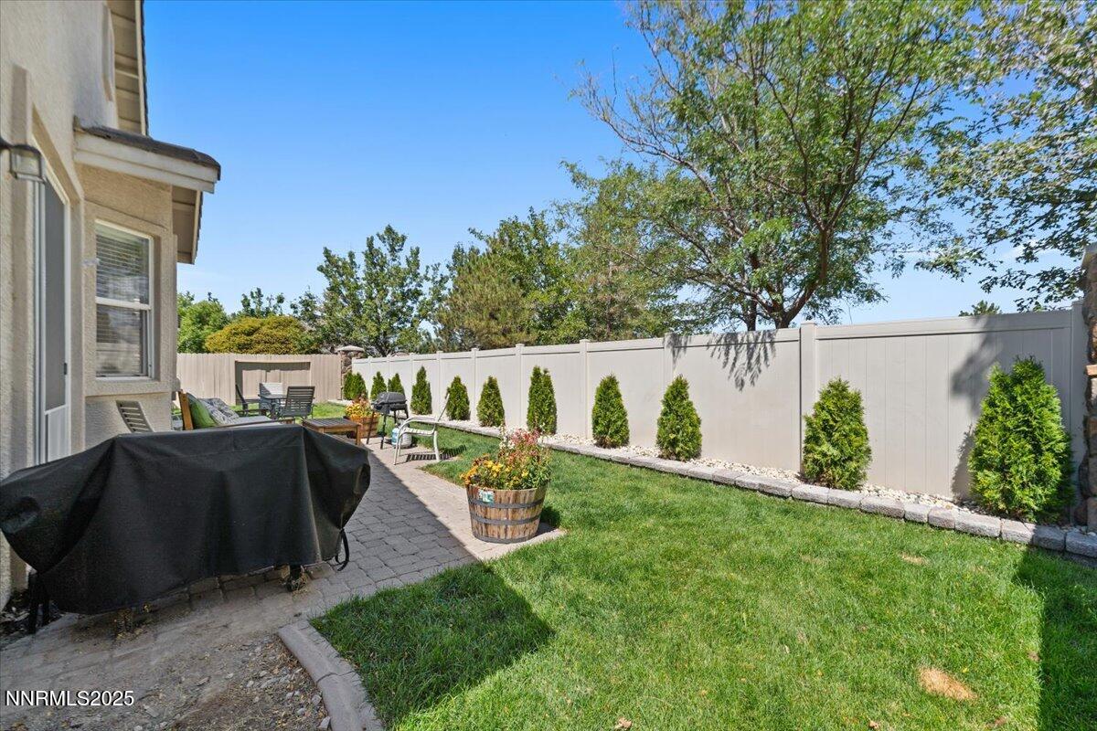 2415 Lincoln Meadows Drive Reno, NV 89521 - Photo 37 of 38 a view of a house with backyard and sitting area
