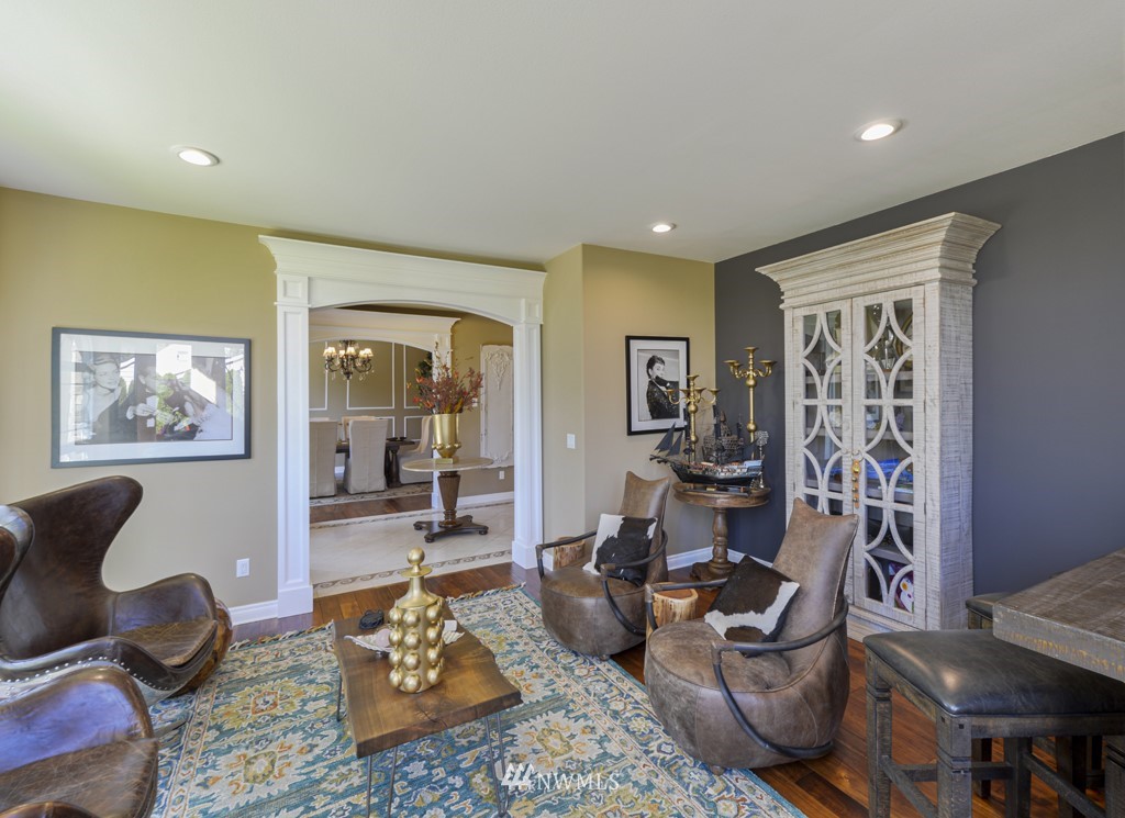 9908 Meadow Road Southwest Lakewood, WA 98499 - Photo 14 of 40 a view of a dining room with furniture and wooden floor