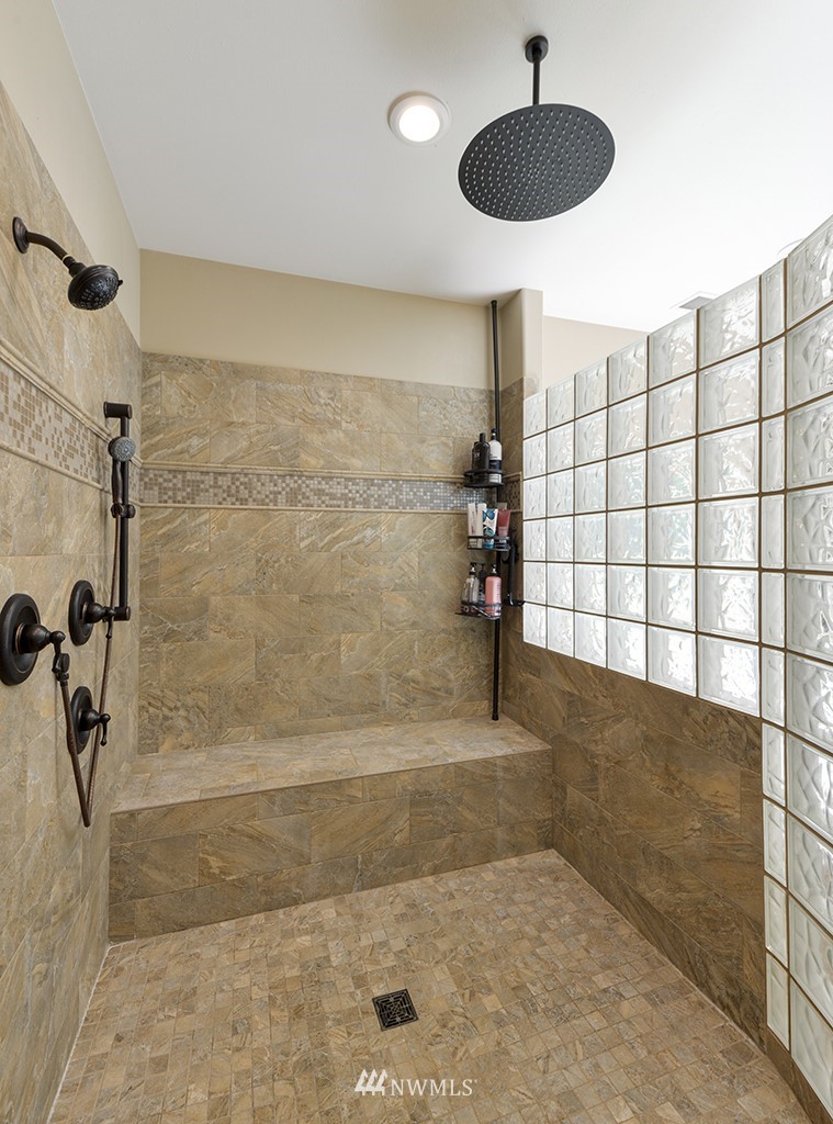 9908 Meadow Road Southwest Lakewood, WA 98499 - Photo 22 of 40 a stove top oven sitting inside of a kitchen