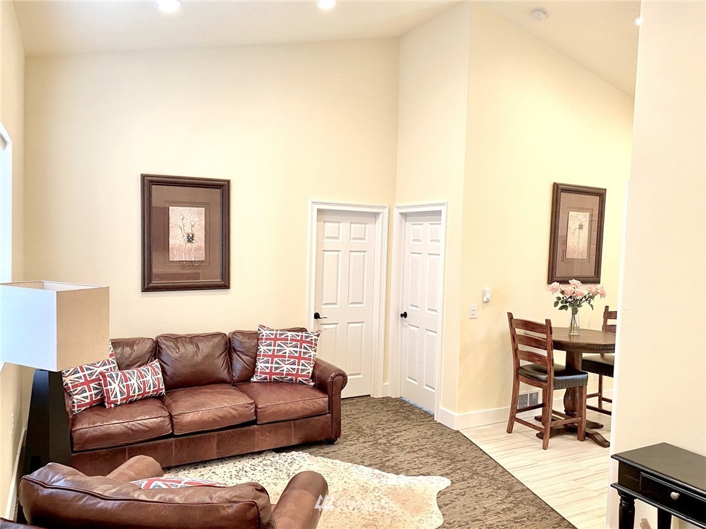 9908 Meadow Road Southwest Lakewood, WA 98499 - Photo 36 of 40 a bedroom with a bed and a cabinets