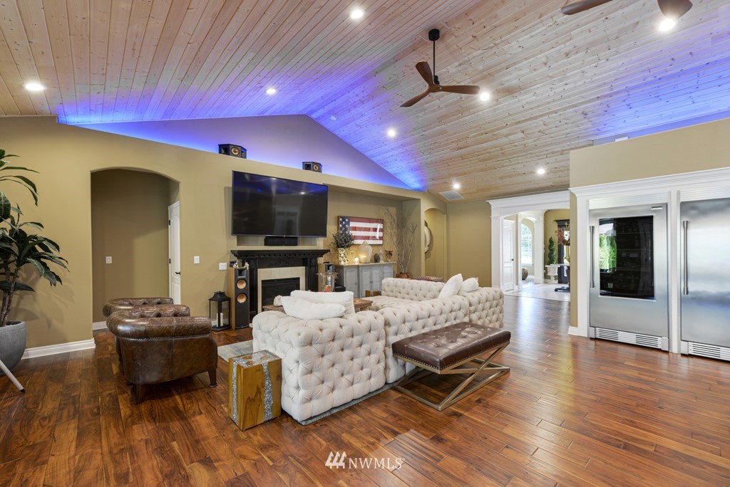 9908 Meadow Road Southwest Lakewood, WA 98499 - Photo 10 of 40 a view of a dining room with furniture and chandelier