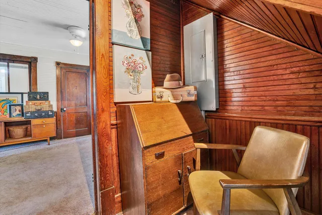 view of living room kitchen with furniture and wooden floor
