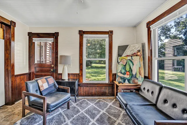 a bathroom with a shower a sink and a mirror