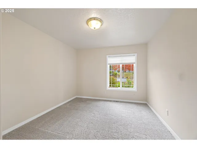 a utility room with faucet washer and dryer
