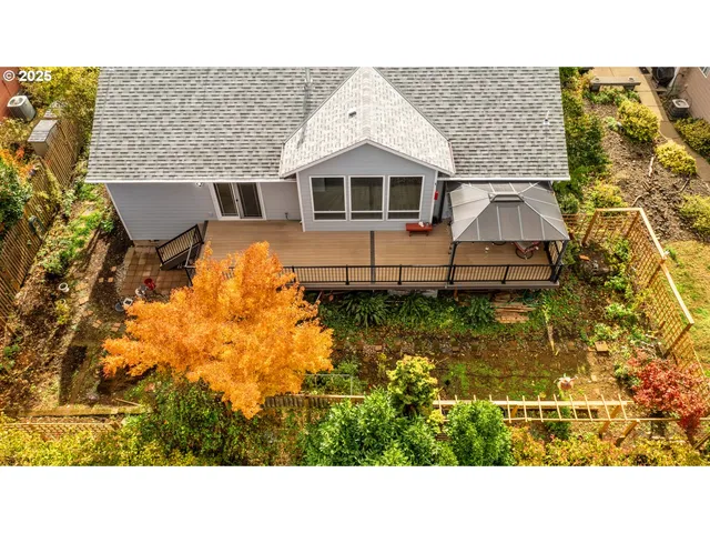 a bathroom with a sink mirror and bathtub