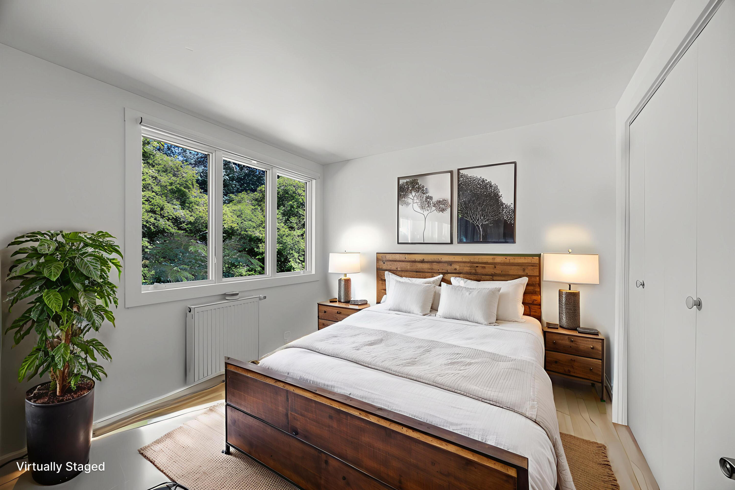 20 Lil's Way Wellfleet, MA 02631 - Photo 16 of 43 a bedroom with a large bed and a potted plant