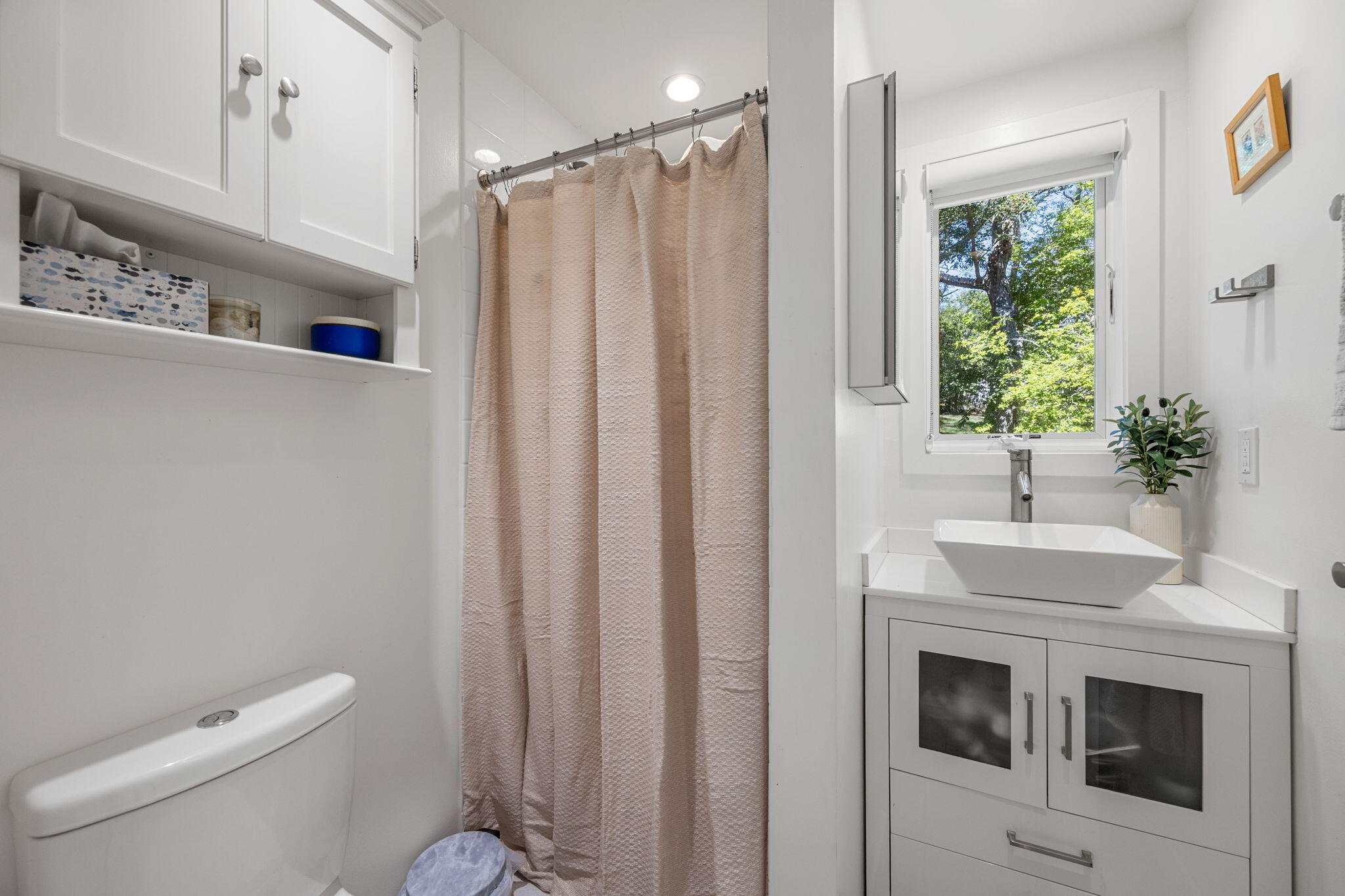 20 Lil's Way Wellfleet, MA 02631 - Photo 17 of 43 a bathroom with a sink a toilet a window and shower