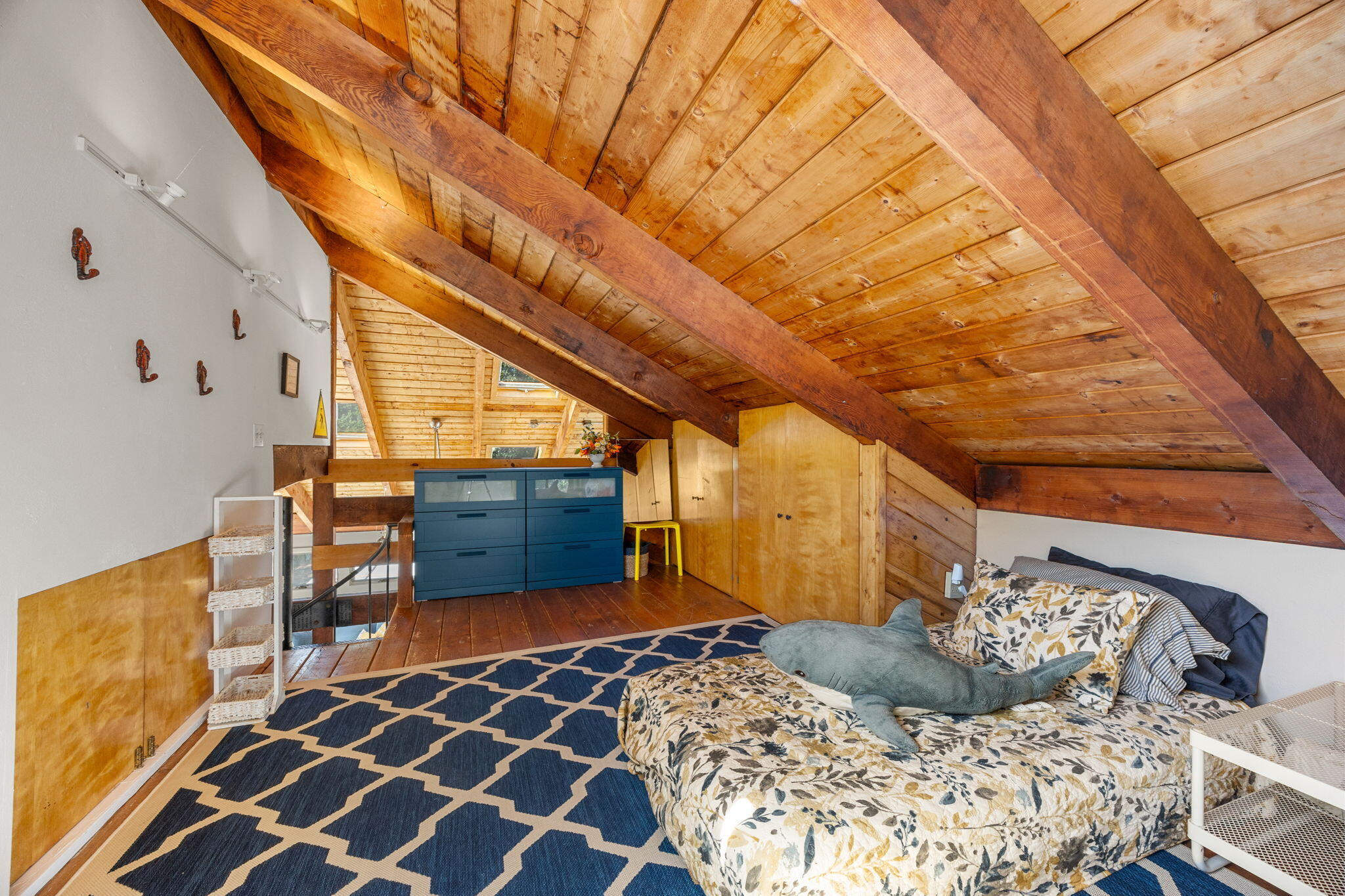 20 Lil's Way Wellfleet, MA 02631 - Photo 19 of 43 a bedroom with a bed and wooden floor