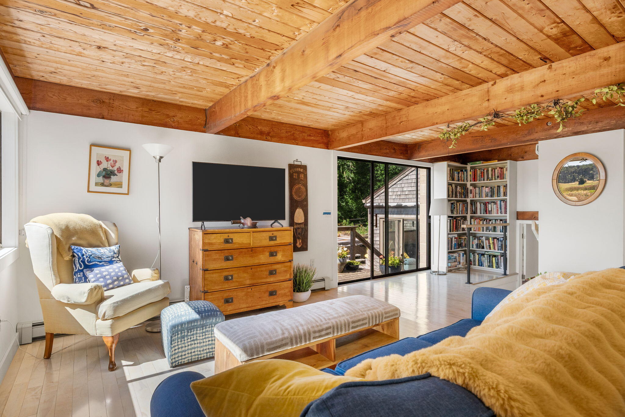 20 Lil's Way Wellfleet, MA 02631 - Photo 22 of 43 a bedroom with furniture and a flat screen tv