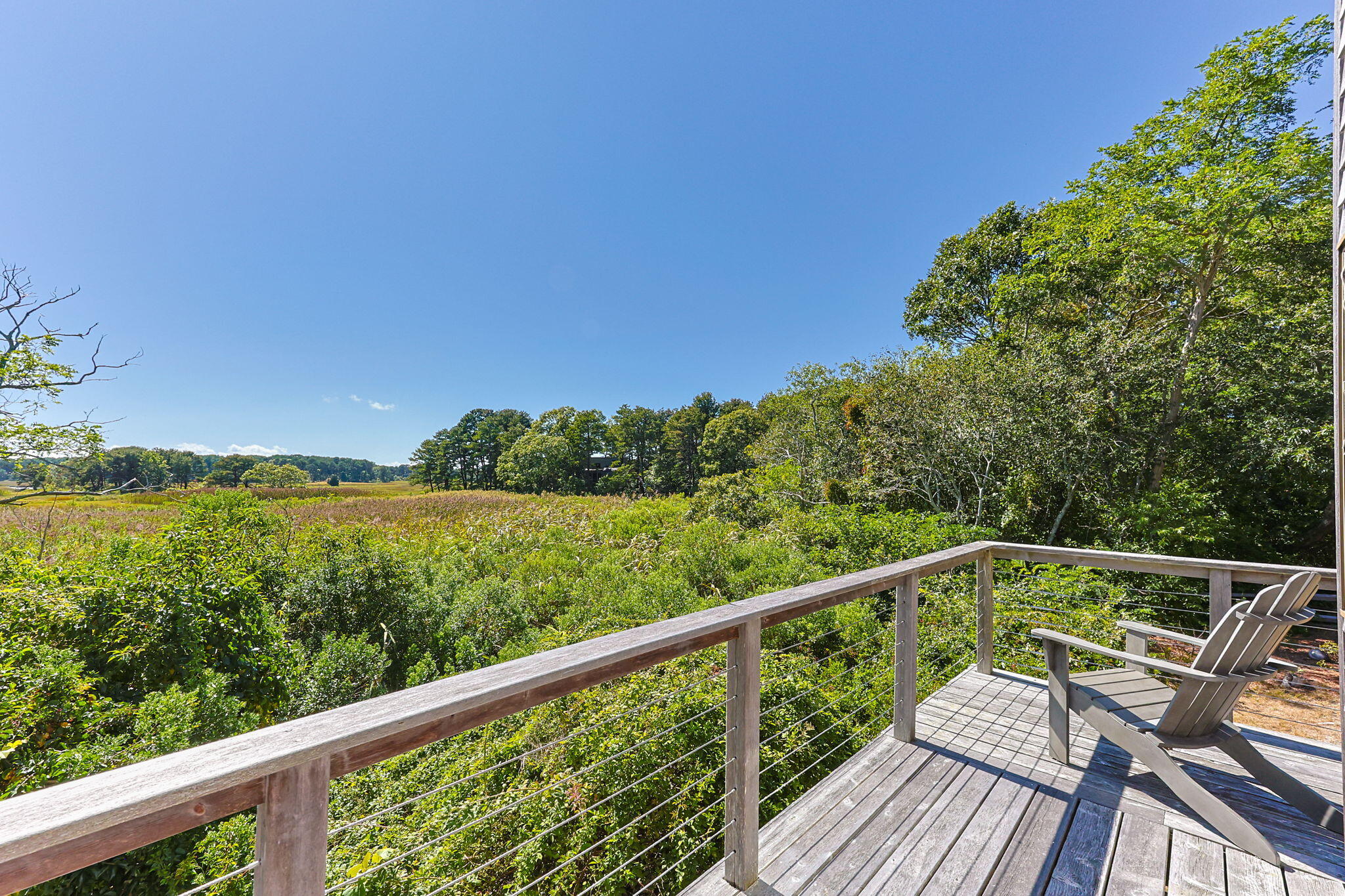 20 Lil's Way Wellfleet, MA 02631 - Photo 33 of 43 a view of a balcony with wooden floor and fence