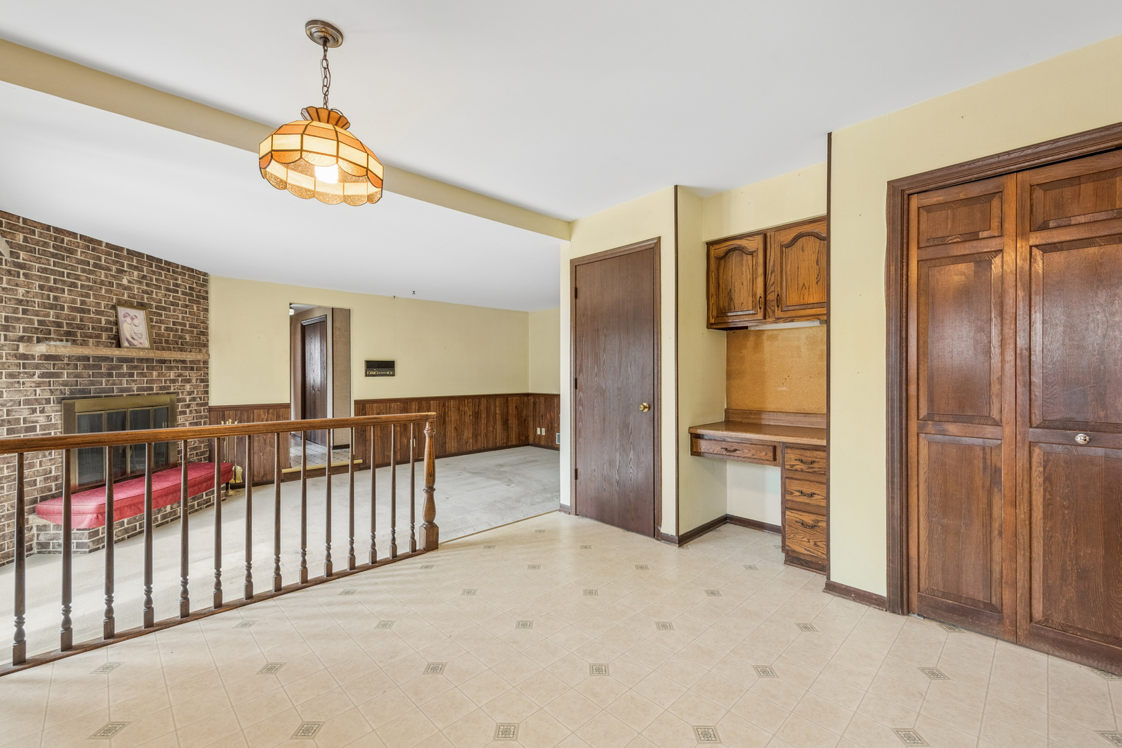 5017 Kenneth Drive Crystal Lake, IL 60014 - Photo 11 of 20 a view of a hallway with a chandelier
