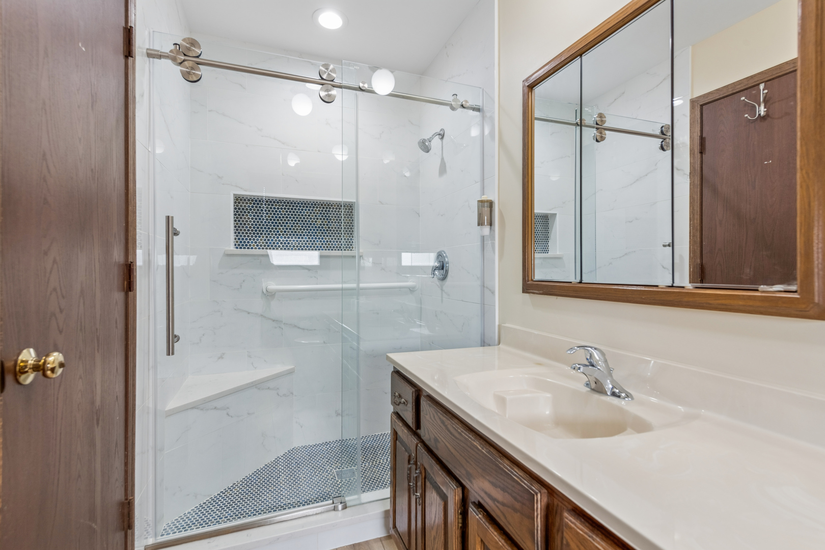 5017 Kenneth Drive Crystal Lake, IL 60014 - Photo 15 of 20 a bathroom with a sink and a mirror