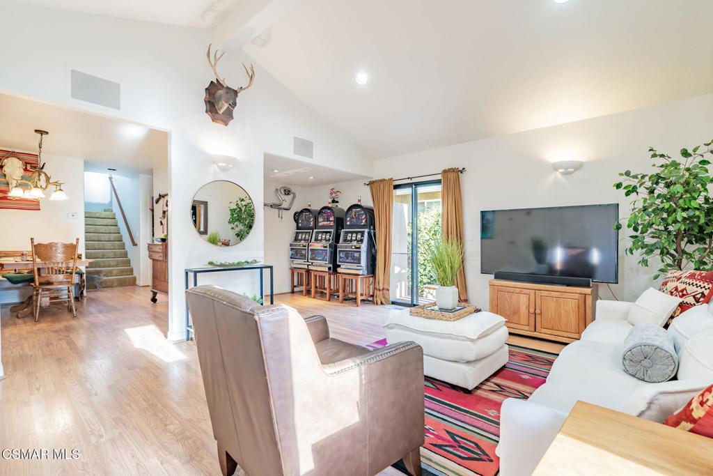 6078 Peppertree Lane Simi Valley, CA 93063 - Photo 11 of 59 a living room with furniture and a flat screen tv