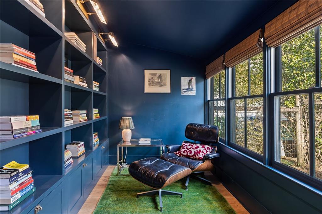 1021 Gilbert Street Southeast Atlanta, GA 30316 - Photo 4 of 24 a room with furniture and a large window