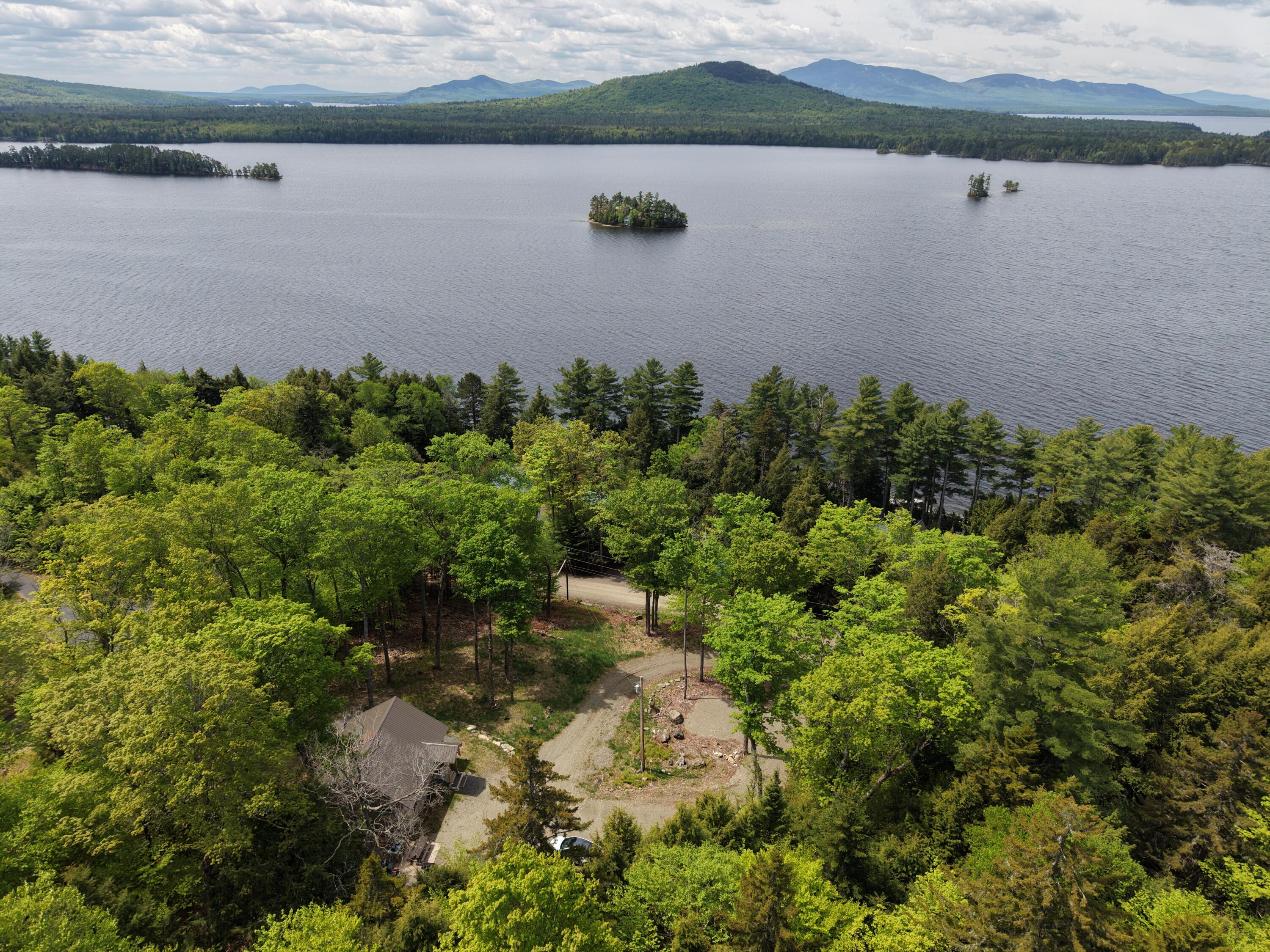 349 Black Point Road Beaver Cove, ME 04441 - Photo 2 of 71 DJI_20260527113422_0042_D