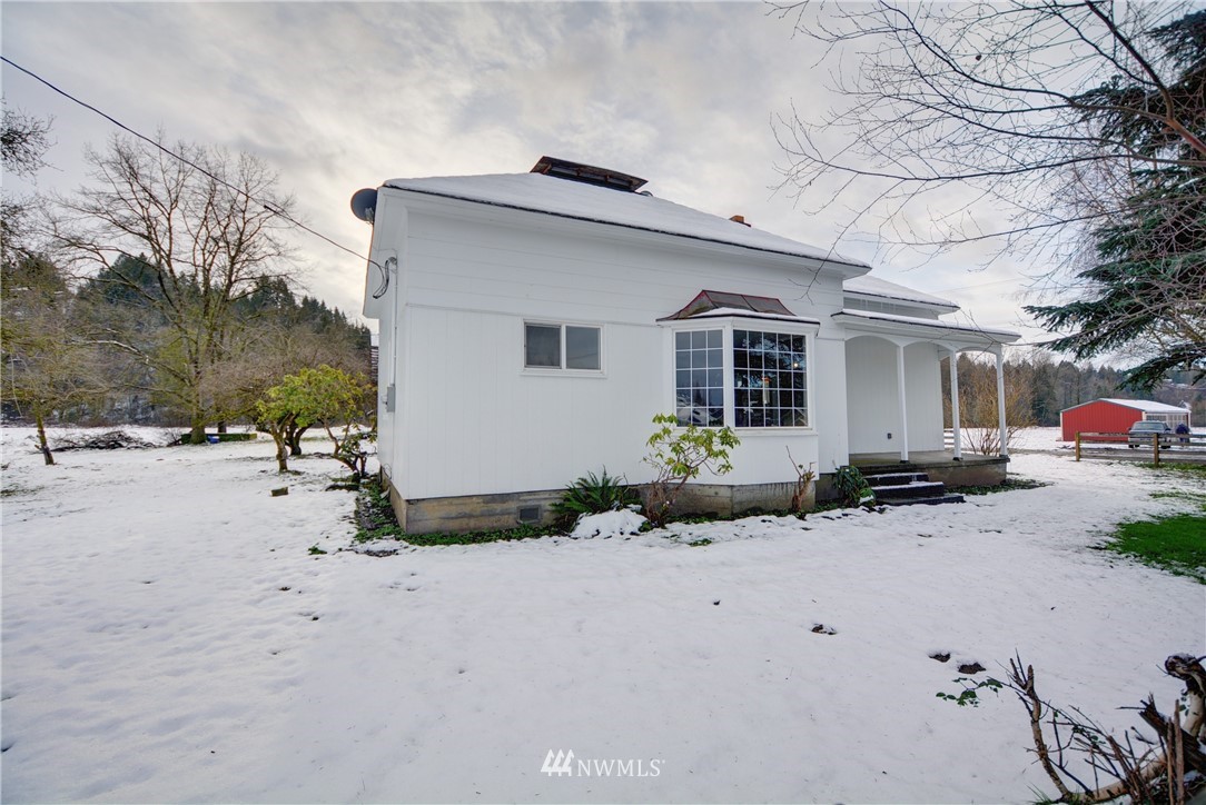 1603 South Machias Road Snohomish, WA 98290 - Photo 13 of 28 a front view of a house with a yard
