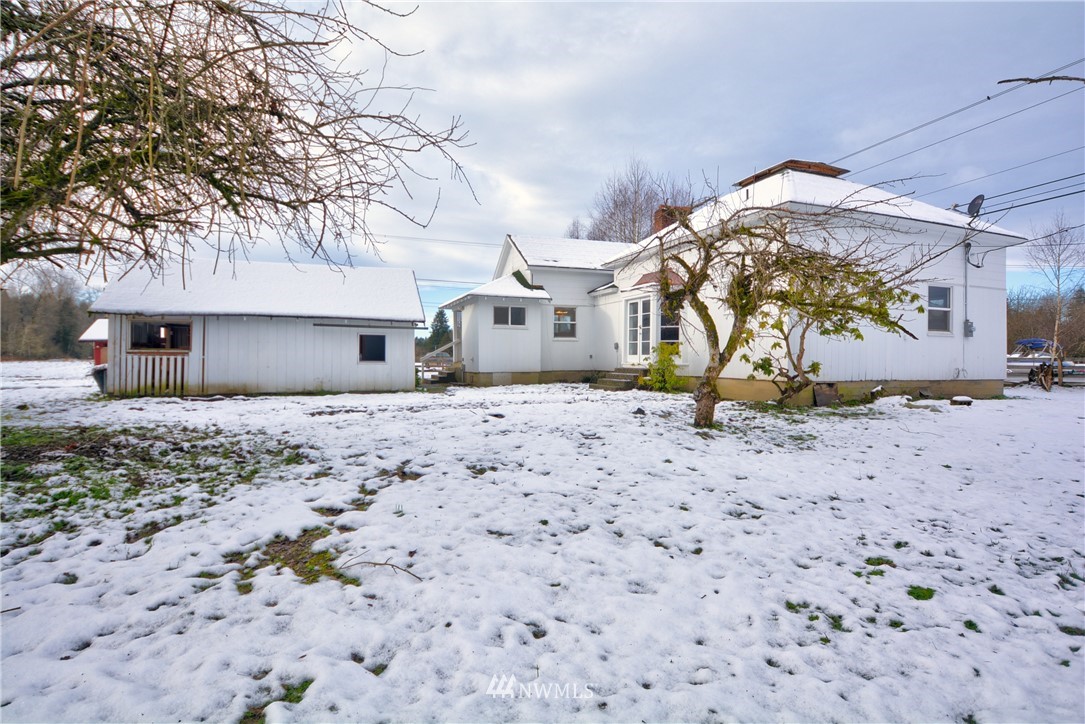 1603 South Machias Road Snohomish, WA 98290 - Photo 14 of 28 a view of a yard with a house and a tree