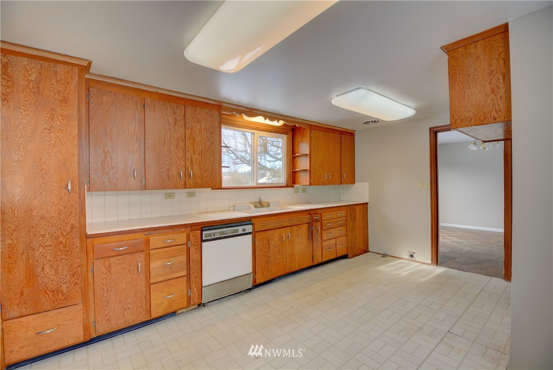 1603 South Machias Road Snohomish, WA 98290 - Photo 4 of 28 a large kitchen with stainless steel appliances granite countertop a refrigerator and a sink