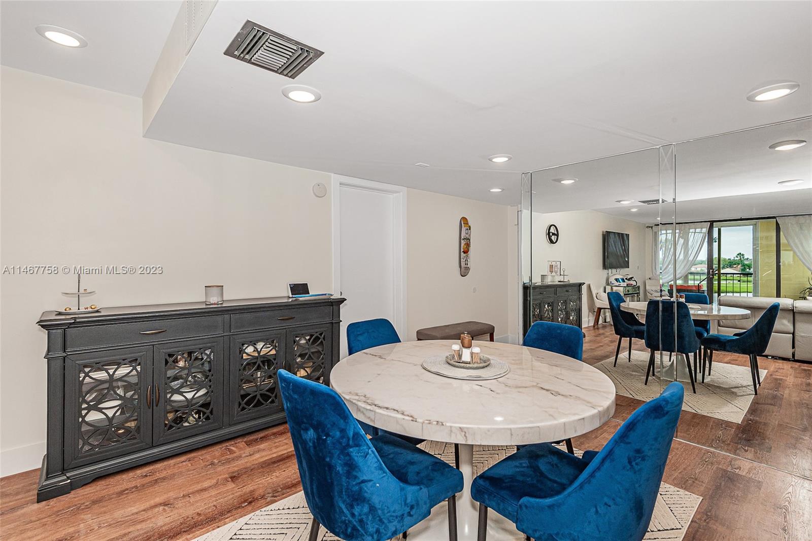 16401 Golf Club Road, Unit 311 Weston, FL 33326 - Photo 12 of 33 a view of a dining room with furniture