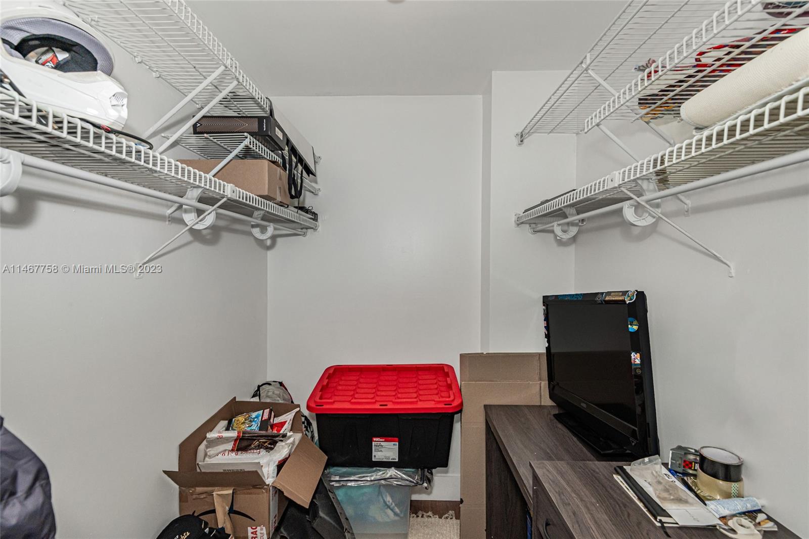 16401 Golf Club Road, Unit 311 Weston, FL 33326 - Photo 26 of 33 a view of a workspace with furniture