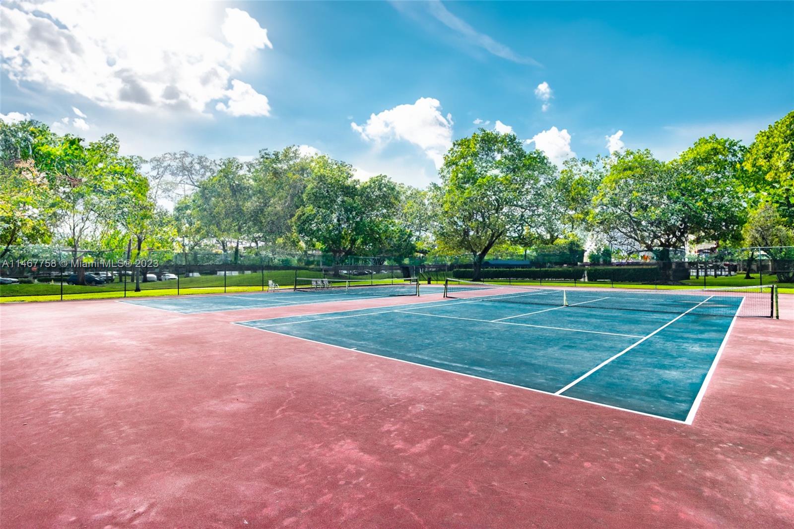 16401 Golf Club Road, Unit 311 Weston, FL 33326 - Photo 32 of 33 a view of a volley ball court