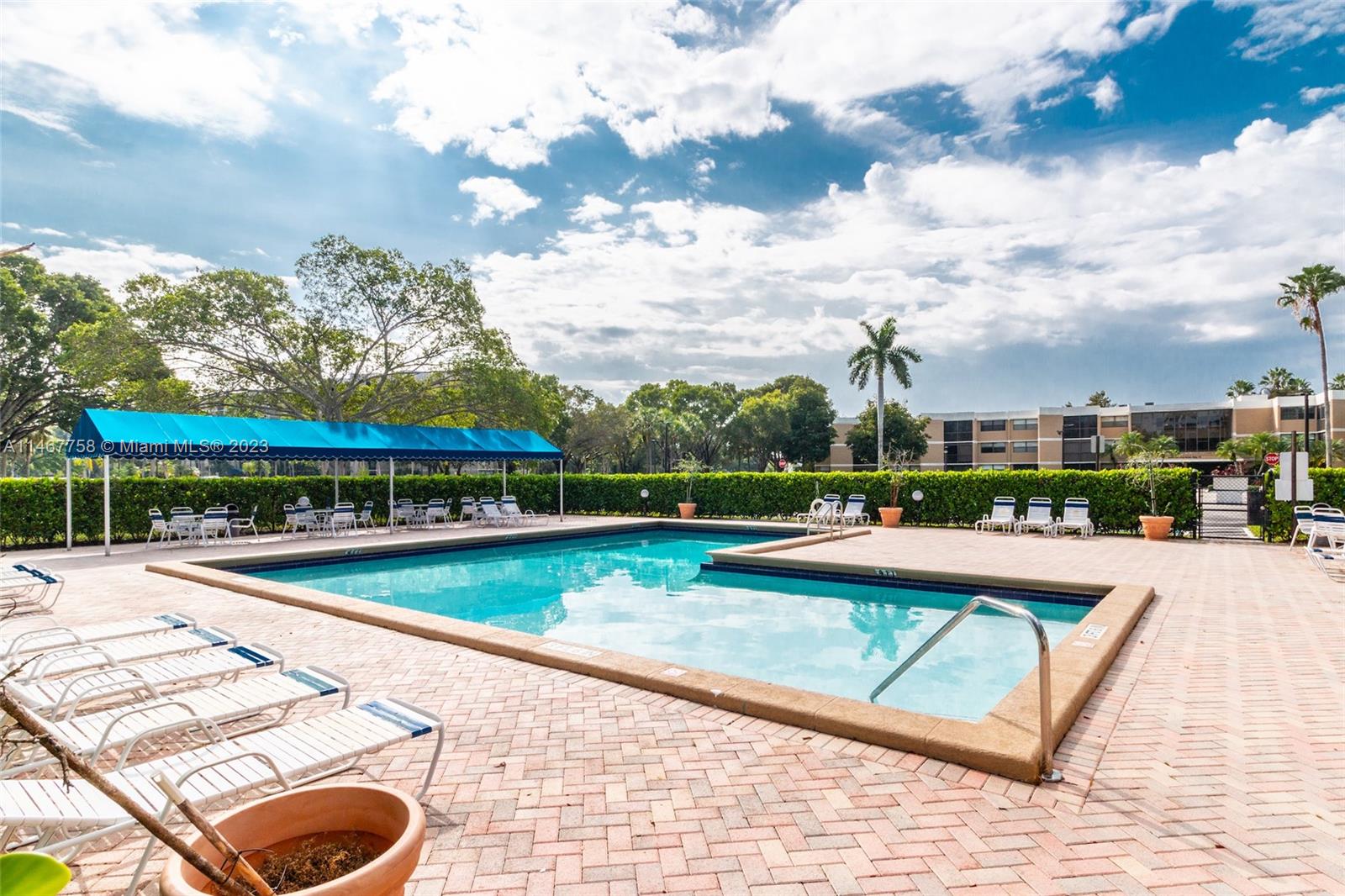 16401 Golf Club Road, Unit 311 Weston, FL 33326 - Photo 33 of 33 a view of swimming pool from a balcony