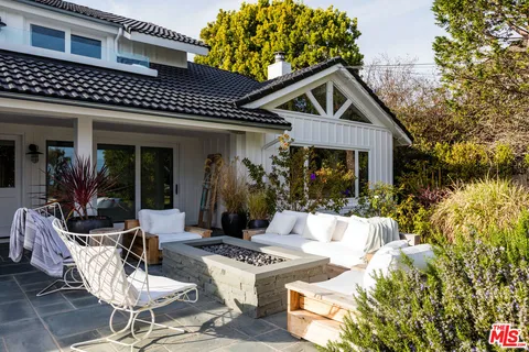 a view of a park with large trees