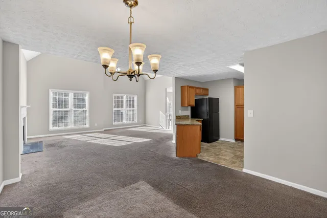 a view of a kitchen with a sink and dishwasher kitchen view