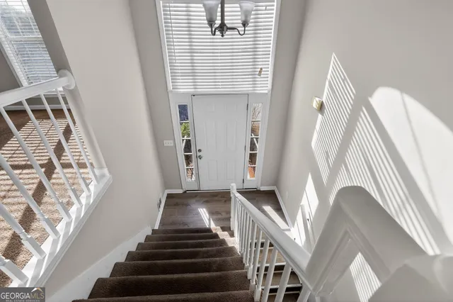 a view of an entryway with staircase