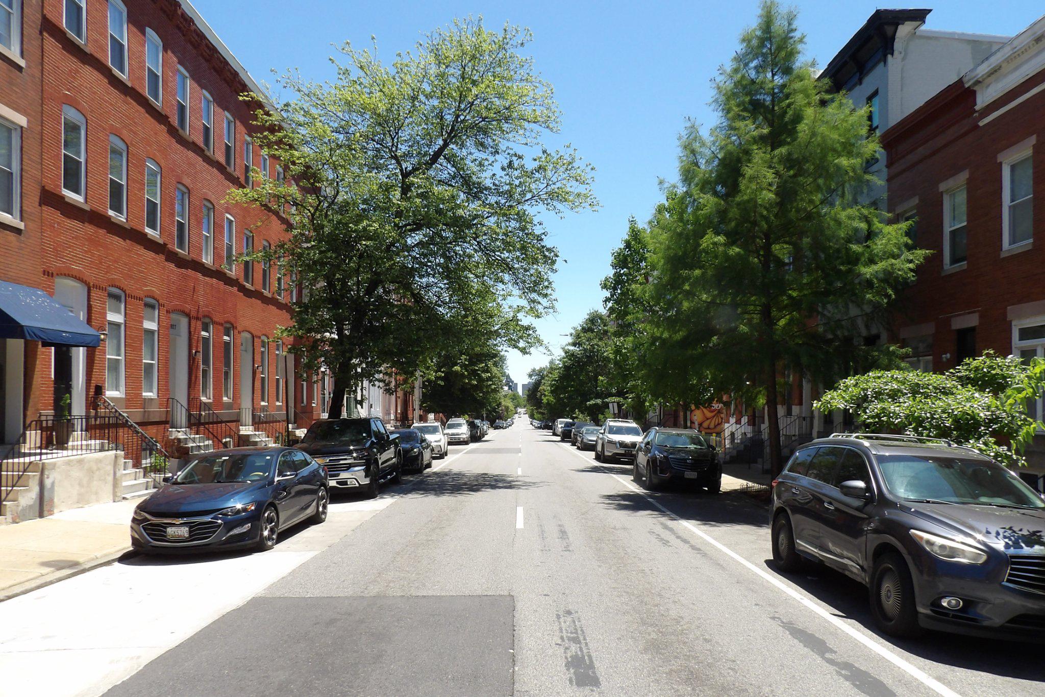 1932 McCulloh Street Baltimore, MD 21217 - Photo 2 of 11 a view of a street with cars on road