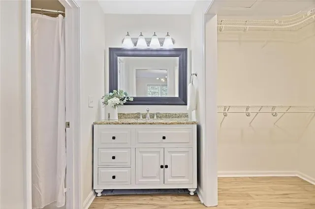 a view of a dresser with mirror