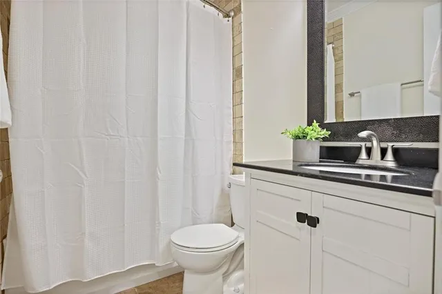 a bathroom with a sink and a toilet