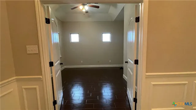 a kitchen with kitchen island granite countertop stainless steel appliances and a counter top